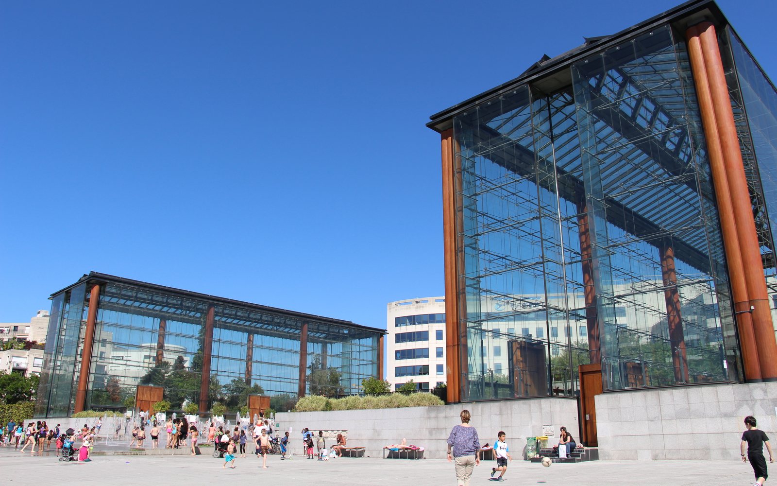 The glasshouses and lawn at Parc André Citroën in Paris